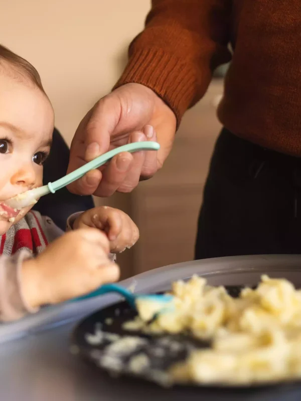 little-boy-is-learning-to-eat-complementary-feedi-2022-11-11-17-27-54-utc